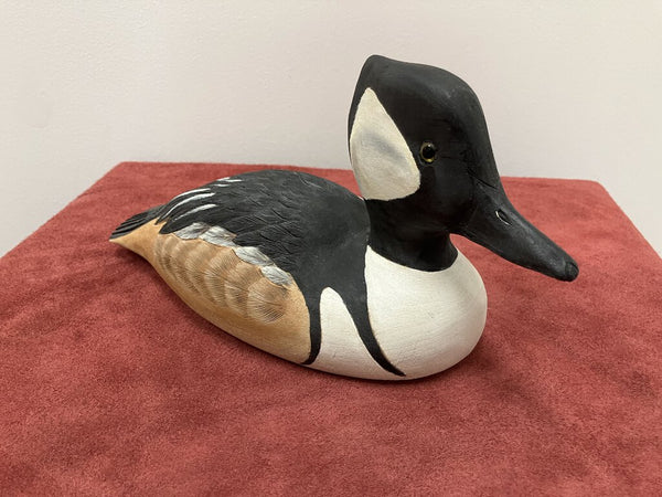 Carved wooden ducks, signed by artist