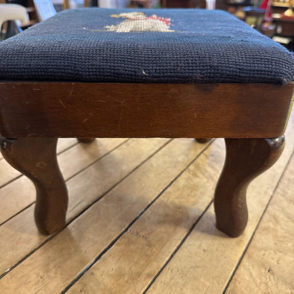 Old needlepoint footstool of a dog some wear on top of 9.5” square x 8” h