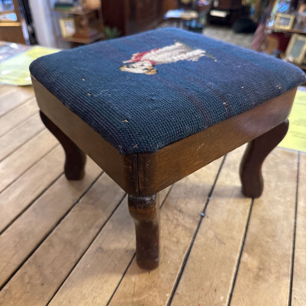 Old needlepoint footstool of a dog some wear on top of 9.5” square x 8” h