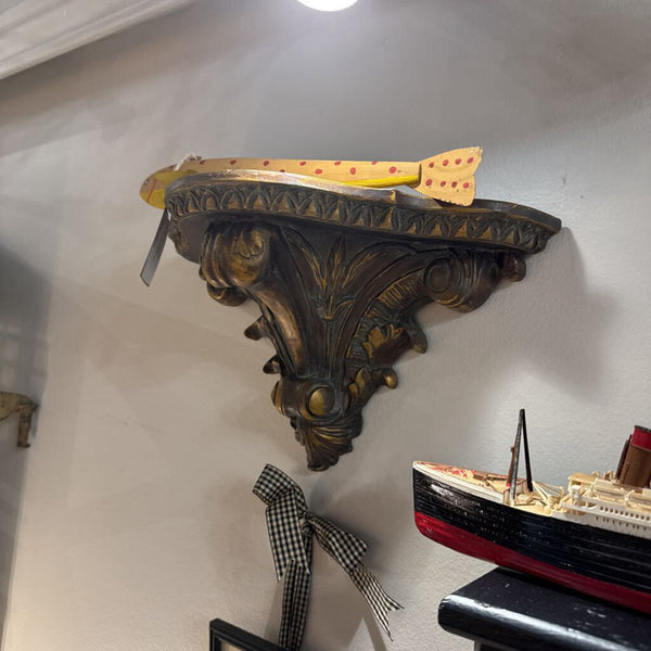 Pair of gilded wall shelves