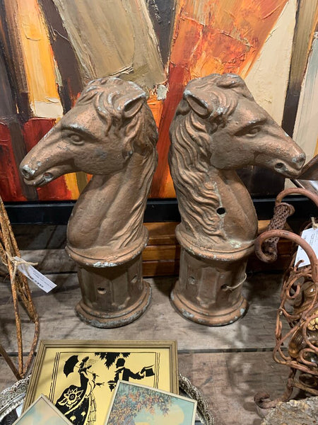 Antique pair of cast iron horse head finials