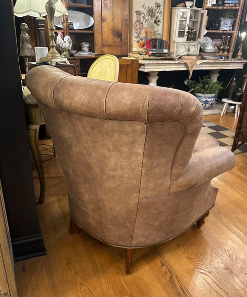 DISTRESSED LEATHER WRITER'S CHAIR AND OTTOMAN, NAILHEAD TRIM. FROM PEABODY’S, MEQUON, WI. 39"H x 37"W x 40"D, OTTOMAN DIM: 26"W x 22"D x 17"H, IN STORE PICKUP
