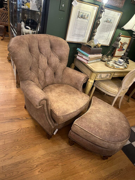 DISTRESSED LEATHER WRITER'S CHAIR AND OTTOMAN, NAILHEAD TRIM. FROM PEABODY’S, MEQUON, WI. 39"H x 37"W x 40"D, OTTOMAN DIM: 26"W x 22"D x 17"H, IN STORE PICKUP
