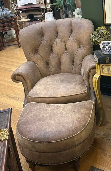 DISTRESSED LEATHER WRITER'S CHAIR AND OTTOMAN, NAILHEAD TRIM. FROM PEABODY’S, MEQUON, WI. 39"H x 37"W x 40"D, OTTOMAN DIM: 26"W x 22"D x 17"H, IN STORE PICKUP
