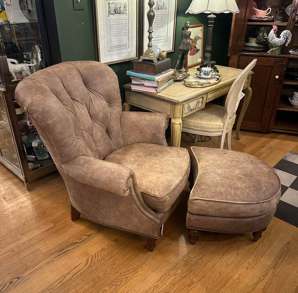 DISTRESSED LEATHER WRITER'S CHAIR AND OTTOMAN, NAILHEAD TRIM. FROM PEABODY’S, MEQUON, WI. 39"H x 37"W x 40"D, OTTOMAN DIM: 26"W x 22"D x 17"H, IN STORE PICKUP